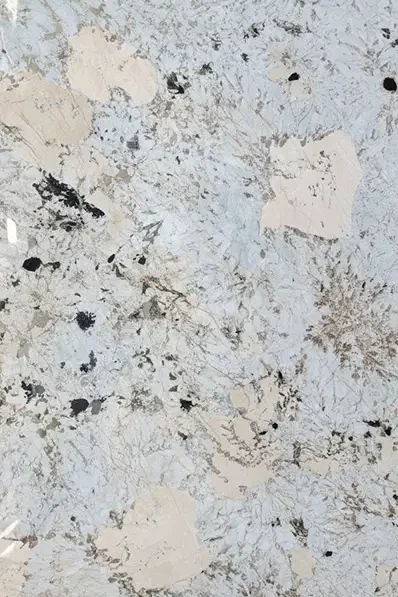 Close-up shot of an Alpine natural stone slab featuring a polished crystalline white background with dramatic brown veins, sold by EtternaG.